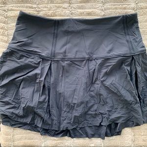 Lululemon Black Golf/Tennis Skirt with pockets. Size 8 Tall.